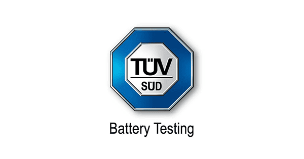 Et åttekantet TÜV SÜD-logo i blått og sølv med teksten «Batteritest» under.